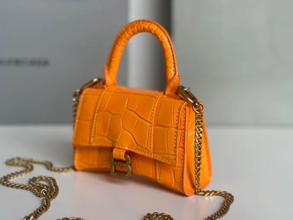 Balenciaga hourglass bag orange model: 169 size: 12104.5cm - Image 8