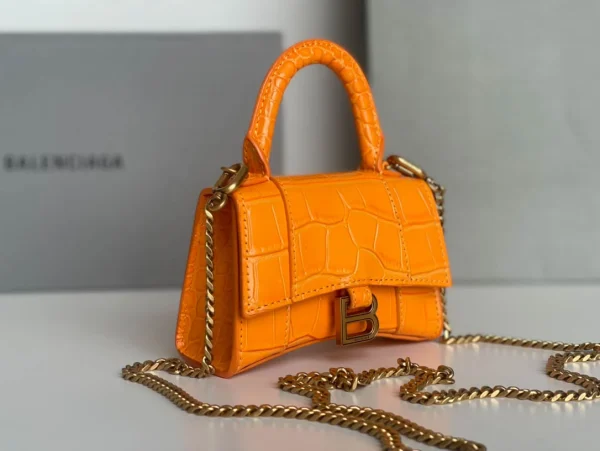 Balenciaga hourglass bag orange model: 169 size: 12104.5cm - Image 9